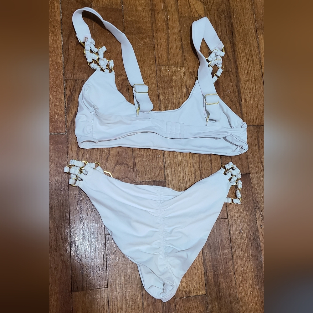 White Women's Two-Piece Bikini Set with Gold Accent Hardware